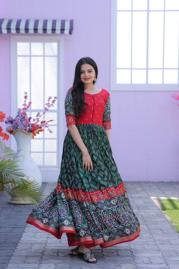 Green Dola Silk Gown with Patola Designer Foil Print and Short Sleeves for Festive & Occasion Wear