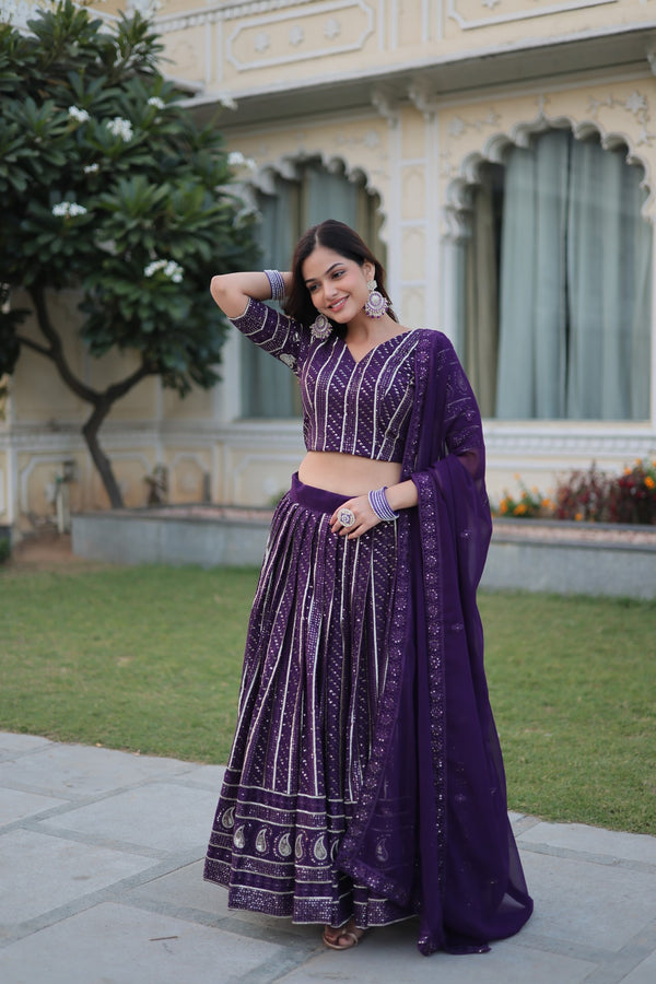 Stunning Dark Purple Faux Blooming Lehenga Choli with Heavy Sequins and Zari Embroidery