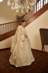 Elegant Beige Art Silk Lehenga with Thread & Sequin Embroidery
