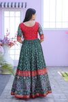 Green Dola Silk Gown with Patola Designer Foil Print and Short Sleeves for Festive & Occasion Wear