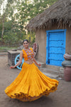 Navratri Special Yellow Rayon Lehenga Choli with Gamthi Embroidery Work and Koti